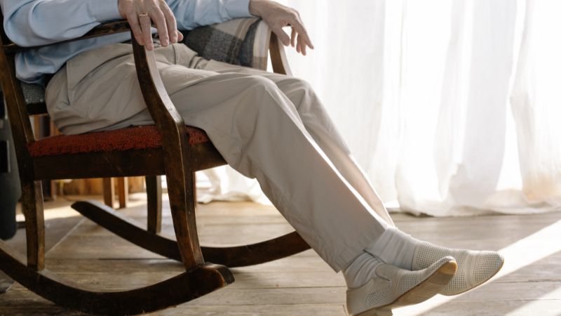 Elderly Man Sitting on a Rocking Chair